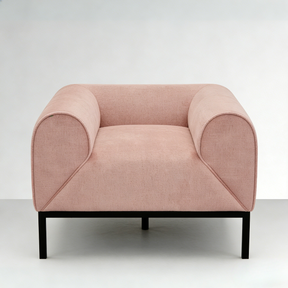 Pink armchair with black legs on a white background
