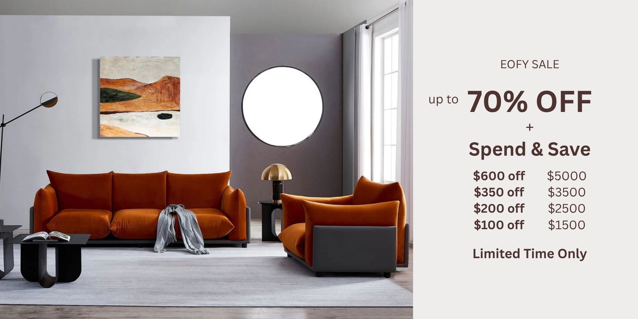 Modern living room with orange sofa and chair, promotional text for sale on the right.