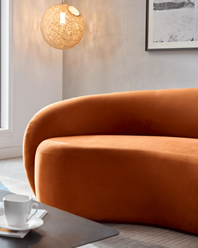 Curvo 3 Seater Velvet Sofa - Burnt Orange on Front Half Side View in Room Setting