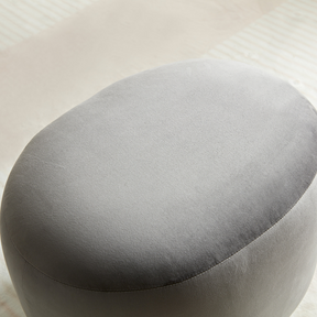 Curvo Velvet Oval Ottoman - Grey on Angled Top View in Room Setting