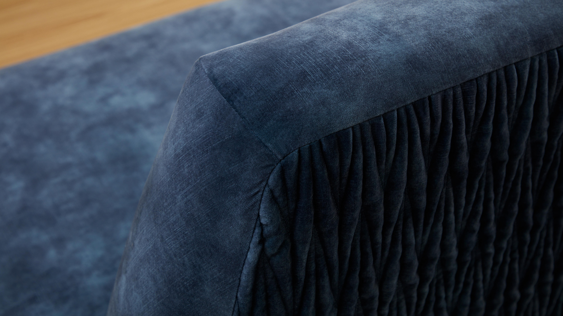 Ocean Sofa with Pinch Stitch Fabric on Close Up Shot