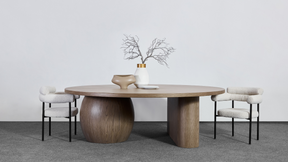 Orb Timber Dining Table with 2 Cassandra Ivory Boucle Dining Chairs in a Room Setting