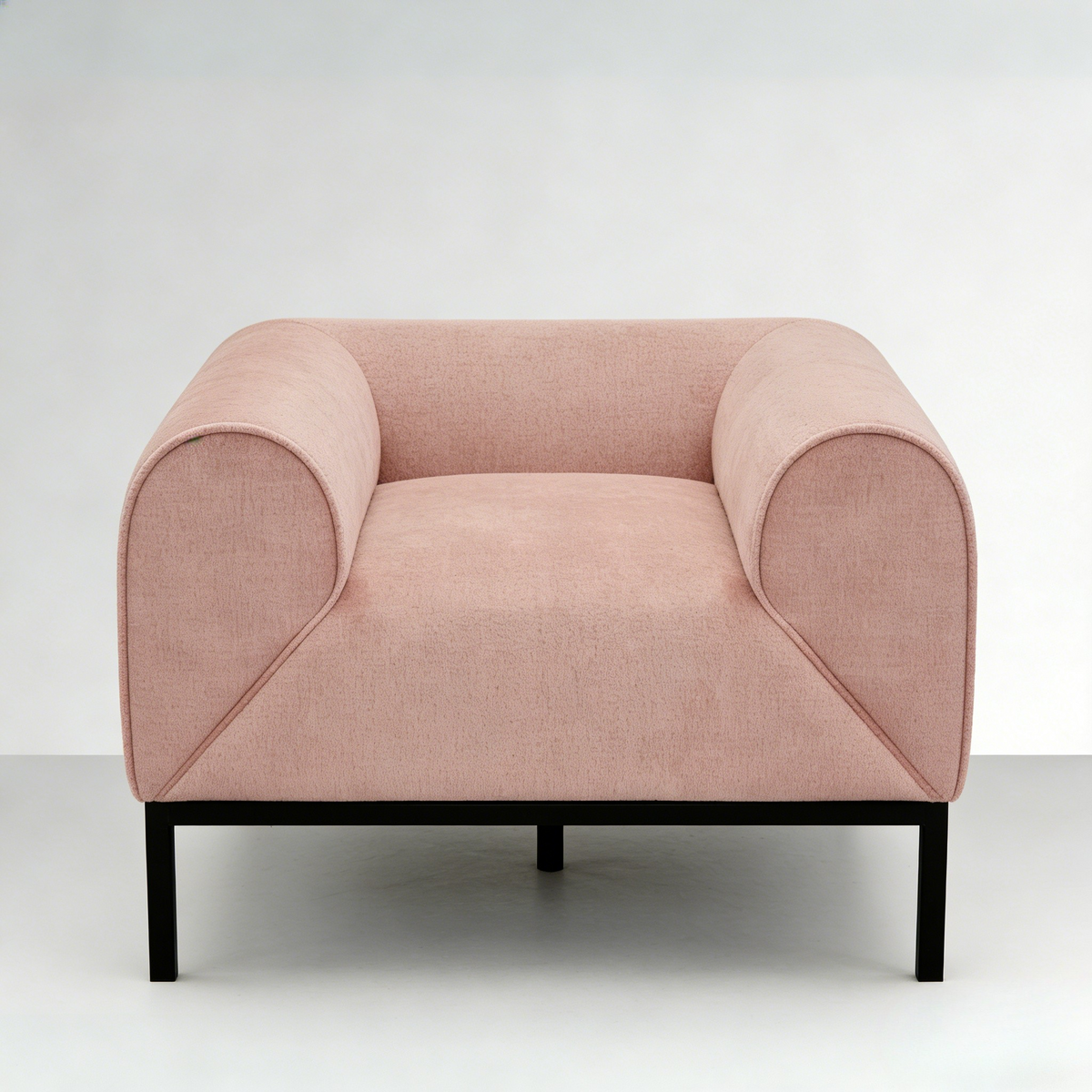 Pink armchair with black legs on a white background