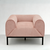 Pink armchair with black legs on a white background
