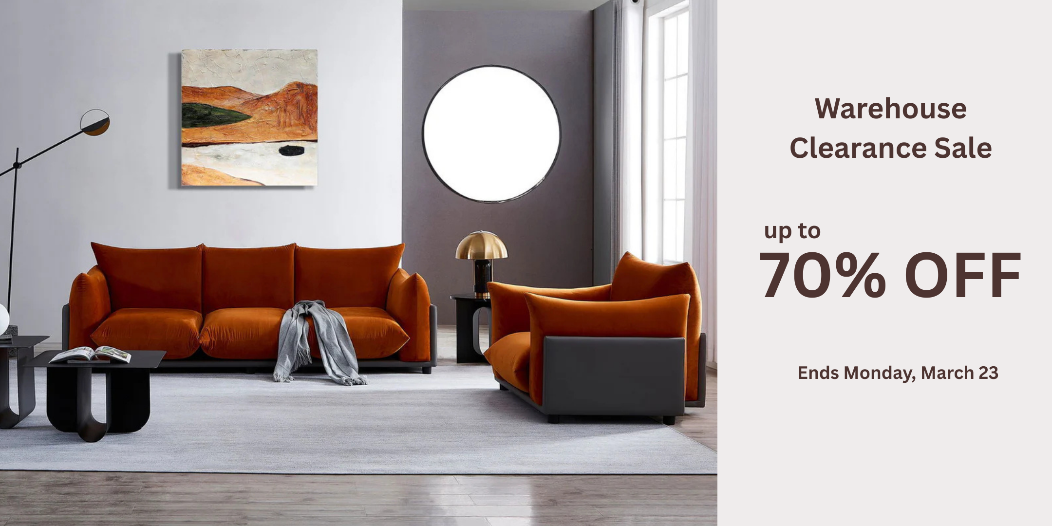 Modern living room with orange sofa and chair, featuring a warehouse clearance sale advertisement.