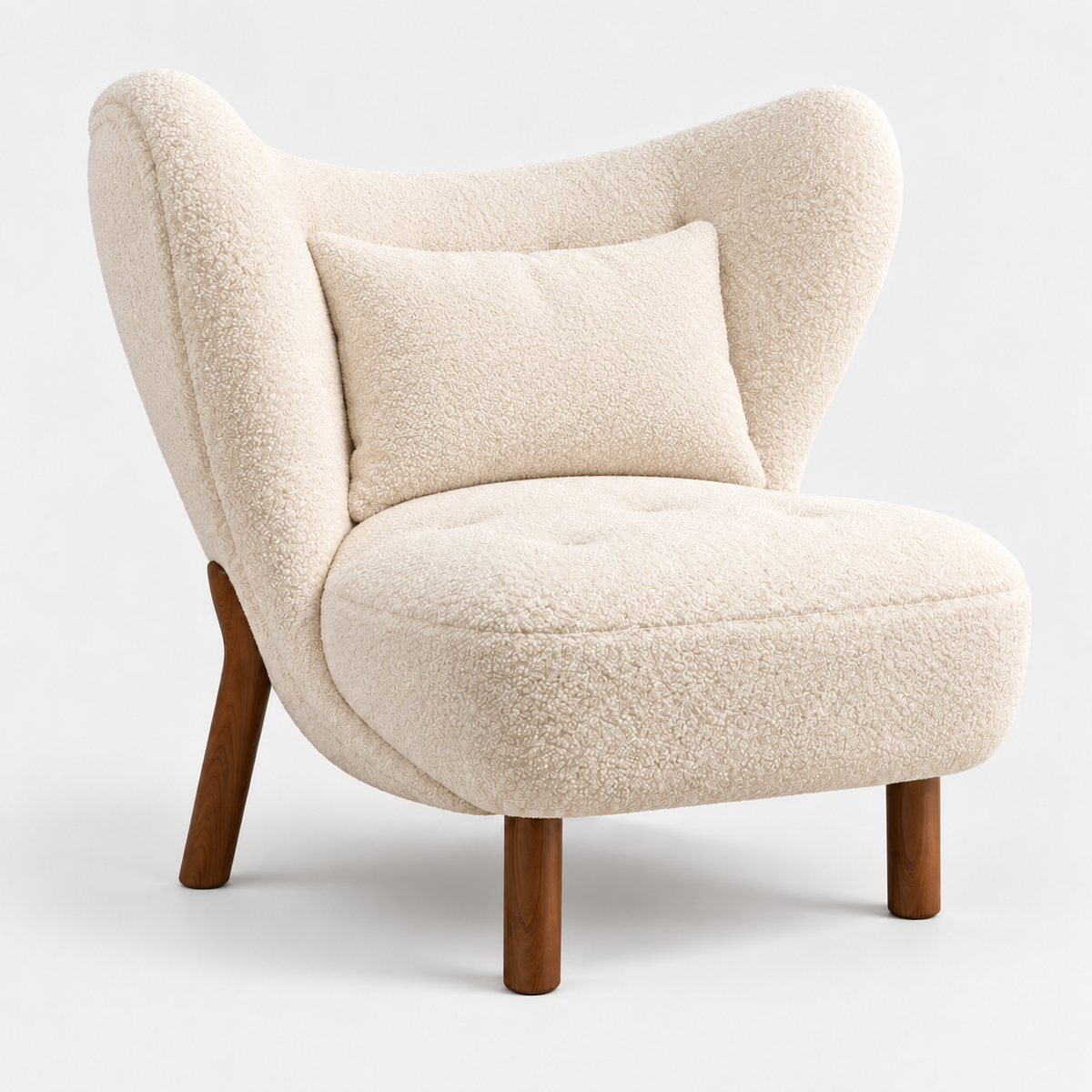 Fleur Lounge Chair in ivory faux sheepskin with cushion, angled view