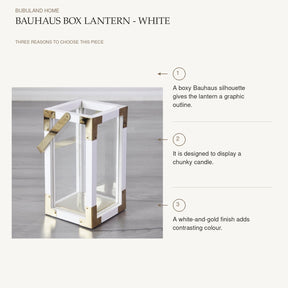 Bauhaus Box Lantern - White: A boxy Bauhaus silhouette gives the lantern a graphic outline. It is designed to display a chunky candle. A white-and-gold finish adds contrasting colour.