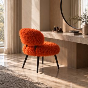 Orange faux sheep fur chair styled at a modern dressing table
