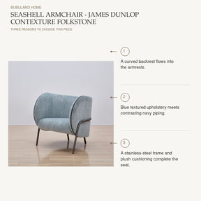 Seashell Armchair - James Dunlop Contexture Folkstone: A curved backrest flows into the armrests. Blue textured upholstery meets contrasting navy piping. A stainless-steel frame and plush cushioning complete the seat.