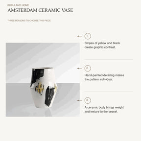 Amsterdam Ceramic Vase: Stripes of yellow and black create graphic contrast. Hand-painted detailing makes the pattern individual. A ceramic body brings weight and texture to the vessel.